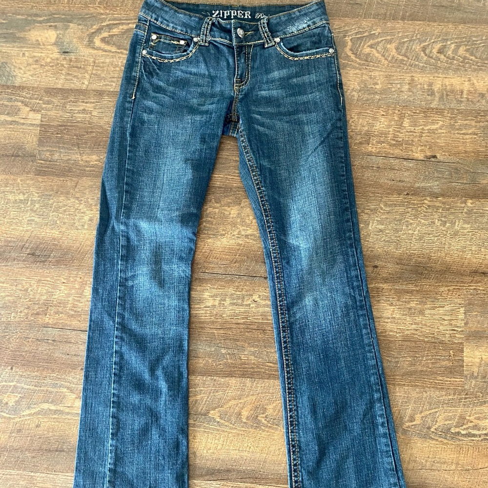 Zipper premium size 9 flare jeans with fleur de lis pocket embroidery/bedazzle